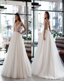 Cheap Boho A-line Wedding Dresses Sexy V-neck Sleeveless Appliqued Lace Beaded Bridal Dress Backless Sweep Train Bridal Gown Hot Sale