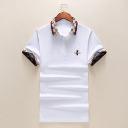 tuta kenzo rosso strisce bianche