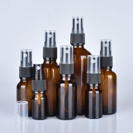 glass spray bottles for oils NZ - Free Shipping 10pcs 10ml 15ml 30ml 50ml Amber Glass Spray Bottles with Black Fine Mist Sprayers for Essential Oils, Perfumes