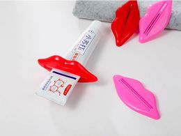 toothpaste dispenser DHL 300Sets(2Pcs/Set) Lip Kiss Bathroom Tube Dispenser Toothpaste Cream Squeezer SN101