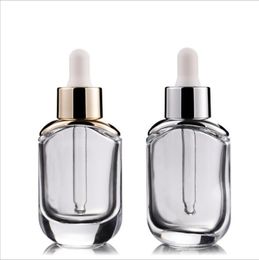 High-Grade Transparent Cosmetic Bottle 30ml Essence liquid foundation dropper bottle with gold silver cap in stock