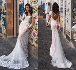 Gorgeous Champagne Sweetheart Country Wedding Dresses 2019 Sheer Long Sleeve Illusion Back Mermaid Lace Appliques Tulle Bridal Gowns