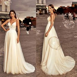 2020 Wedding Dresses Spaghetti Strap Sleeveless A-line Bridal Dress Appliqued Lace Beach Sweep Train Backless Robes De Mariée Custom Made