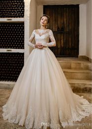 Sexy Elegant White Wedding Dresses A Line Jewel Long Sleeve Lace Applique Bridal Gowns Sweep Train Wedding Gowns Vestidos De Mariee