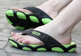 Pantofole Infradito da uomo con suola da massaggio Scarpe da spiaggia antiscivolo in estate e sandali da uomo nei negozi di shopping online per bagni interni in vendita