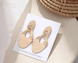 European and American cross-border cold wind metal texture double ring earrings female simple temperament hollow disc long earring WY708