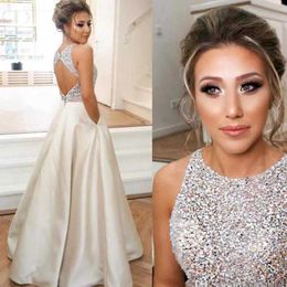 Jewel Top Beaded Prom Dresses Long Puffy Sequin Crystal Floor Length Prom Gowns Couture Keyhole Back Dresses Evening Wear Real Party