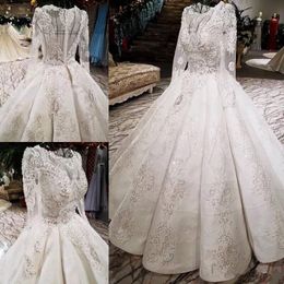 2019 New Luxury Lace Ball Gown Wedding Dresses Arabic Dubai Scoop Neck Bling Crystal Bridal Gown Long Sleeve Plus Size Wedding Dress