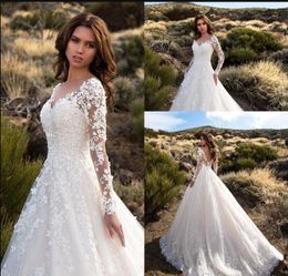 Gorgeous Ivory Sheer illusion Long Sleeves Wedding Dresses v neck Sexy Backless Lace Tulle Bridal Gowns Robe De Mariage 2019 New Arrival