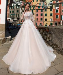 Attractive A Line Long Sleeves Lace Wedding Dresses Off The Shoulder Covered Buttons Back Bridal Gowns Tulle Sweep Train robe de mariée
