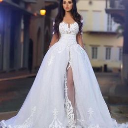 New Counttry A Line Long Sleeves Wedding Dresses Jewel Neck Appliques Lace Sweep Train Illusion Overskirts See Through Formal Bridal Gowns