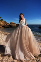 Boho Champagne A Line Wedding Dresses Lace Applique Plunging Neck Beads Sweep Train Beach Wedding Dress Bohemian Wedding Bridal Gowns