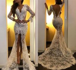 2020 Sexy New Mermaid Wedding Dresses V Neck Long Sleeves Full Lace Appliques Front Split Sheer Sweep Train Backless Plus Size Bridal Gowns