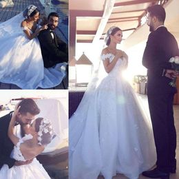 Newest Ball Gown Weddding Dresses A-line Off Shoulder Floral Appliques Tulle Organza Backless Chapel Arabic Bridal Wedding Gowns Dubai