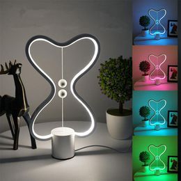 Lámpara de mesa LED inteligente equilibrio Lampara interruptor magnético Flotando en el aire USB creativo dormitorio de noche Noche de luz doble del corazón colorido del regalo