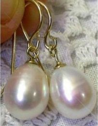 Natural South Sea White 11X13mm Pearl Earrings 14K Gold Clasp