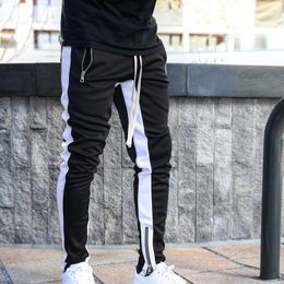 Mens Joggers Casual Pants Fitness Men Sportswear Tracksuit Bottoms Skinny Sweatpants Trousers Black Gyms Jogger Track Pants221a