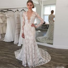 Graceful Lace Wedding Dresses Deep V Neck Sheer Long Sleeves Beach Bridal Dress Illusion Back Covered Buttons Wedding Vestidos 2019