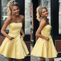 Cheap Lovely Light Yellow Short Homecoming Dresses Strapless Backless Elastic Satin Party Dresses Puffy Cocktail Party Dress With Pocket