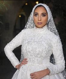 2020 New Design Muslim Arabic A Line Wedding Dresses High Neck Long Sleeves Lace Appliques Beaded Plus Size Sweep Train Puffy Bridal Gowns