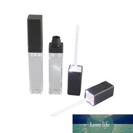 LED light lip gloss bottle container tube with mirror attached on one face black and silver cap