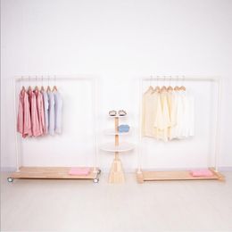 Wooden floor hanger Bedroom Furniture Clothing shop iron wood roller platform Modelling creative simple Nordic style display series rack