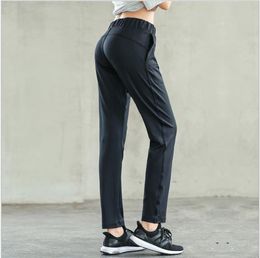 Autumn and Winter New European and American Outdoor Running Leisure Sports Pants Ladies Stitching Beautiful Button Loose and Fast Fitness Yo