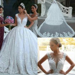 Luxury Arabic Wedding Dresses Plunging Neckline Lace Appliques Cap Sleeves Country Wedding Dress Custom Made Sweep Train Vestidos De Novia