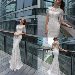 Elegant Crystal Design Mermaid Wedding Dresses Jewel Short Sleeve Lace Applique Tassel Sequins Wedding Gown Sweep Train robe de mariée