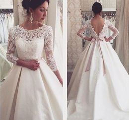 Dubai Arabic 3/4 Long Sleeves Wedding Dress A Line Lace Appliques Backless Country Garden Bride Bridal Gown Custom Made Plus Size