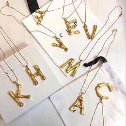 Wholesale- luxe brand letters & initials original copper material designer Jewellery pendat chain charm fashional brass original box set