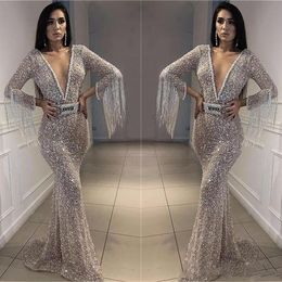 Sparkly Silver Prom Dresses Bling Bling Sequined Mermaid Evening Gowns Deep V Neck Long Sleeves With Tassel Arabic Formal Party Dress