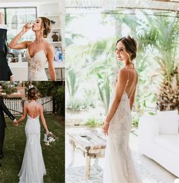 Sexy Backless Spaghetti Strap Bohemian Wedding Dresses Appliqued Lace Cheap Bridal Gown Beach Custom Made Sweep Train Bridal Dress