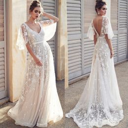 Sexy Boho Beach Wedding Dresses Deep V Neck A Line New Appliques Cheap Half Sleeve Country Holiday Bridal Gowns Backless Wedding Dress