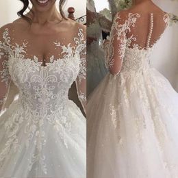 New Elegant Ball Gown Wedding Dresses Sheer Scoop Neck Illusion Long Sleeves Tulle Lace Appliques Beaded Plus Size Bridal Gowns 0424