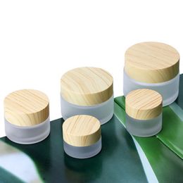 Wood grain cover cream bottle simple environmental protection leak-proof frosted glass round mask water emulsion bottle