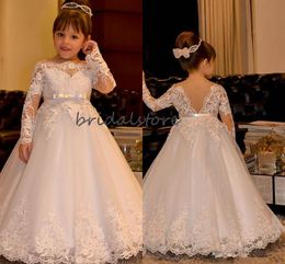 2020 White First Holy Communion Dress A Line Princess Lace Kids Wedding Gowns Sexy Backless Long Sleeve Applique Children Flower Girl Dress