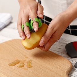 Wholesale Fruit Peeler Stainless Blade Fruit Slicer Double Fingers Cutter Quickly Stripping Kitchen Gadgets Fruit Peeler