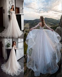 Floral A-line Wedding Dresses Sexy Illusion Long Sleeve Full Appliqued Lace Beaded Sequins Bridal Dress Backless Sweep Train Bridal Gown