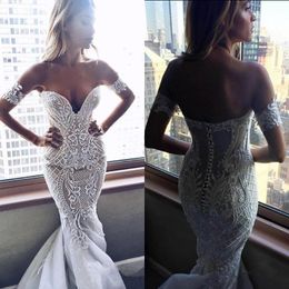 Sexy Nude Ivory Mermaid Wedding Dresses Appliqued Pattern Lace Turkey Dubai Women Long Formal Bridal Gowns Sweetheart Strapless Sweep Train