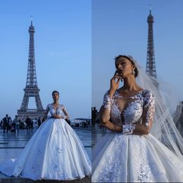 Luxury Ivory Lace Wedding Dresses Ball Gown Satin Sheer Long Sleeves Illusion Back Wedding Bridal Gowns Long Court Train Dubai Arabic