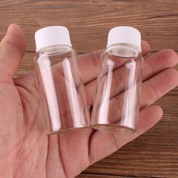 24pcs 27*58mm 20ml Transparent Glass perfume Spice Bottles Container with White Plastic Screw lid