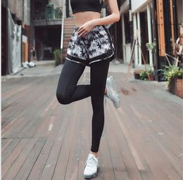 Autumn and winter fitness tightness thin Yoga Pants women breathable speed-dry pants anti-wear off fake two running pants