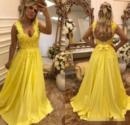 Yellow Satin Prom Dresses Cap Sleeves Straps Lace Applique Beaded Bow Sexy Backless Floor Length Evening Gown Formal Occasion Wear