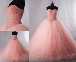 Puffy Skirt Tulle Princess Ball Gown Blush Pink Quinceanera Dresses Ball Gown Sweetheart Pearls Beaded Lace-up Back Bridal Prom Dress