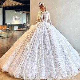 Ball Gown Wedding Dresses With Feathers Appliqued Sequins Long Sleeves Bridal Gowns Keyhole Neck Ruffle Sweep Train Robes De
