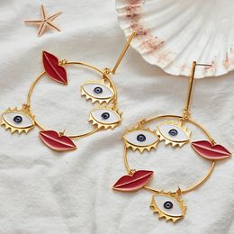 Fashion-New Design Exaggerated Long Big Evil Eyes Lips Charm Gold Loop Dangle Earrings For Women Bohemian Gold Statement Earring