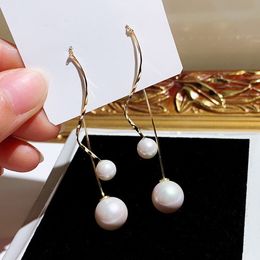 Wholesale-hot new ins fashion trendy special geometry designer pearl linear stud earrings for woman girls dangle chandelier