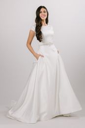 2020 Simple A-line Satin Modest Wedding Dresses With Beaded Cap Sleeves Beaded Belt Buttons Back Elegant Modest Bridal Gowns With Pockets