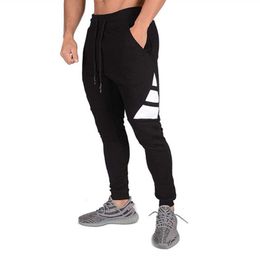 New Men's Brand Hip Hop pants Fitness fashion jogging Pants bodybuilding clothing male sweatpants casual street Leggings Trouser